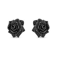 With a whimsical design from the Enchanted Disney Fine Jewelry Villains Collection inspired by Maleficent, these black diamond stud earrings display beauty in darkness. Created in sterling silver with black rhodium plate Each earring showcases a sculpted rose shimmering with black diamonds along the petals. These 1/2 ct. t.w. diamond post earrings secure comfortably with friction backs. ©Disney Black Rose Earrings, Villain Jewelry, Beauty In Darkness, Black Diamond Earrings Studs, Earrings Display, Enchanted Disney, Enchanted Disney Fine Jewelry, Black Diamond Studs, Disney Fine Jewelry