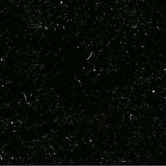 black and white photograph of stars in the night sky with no one on it's side