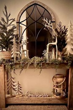 a fireplace mantle decorated with christmas decorations