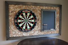 a dart board mounted to the side of a wall