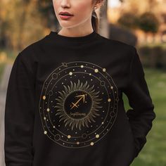 Show off your zodiac sign in style with this unique Zodiac Sagittarius Sweatshirt! With its pretty graphic space theme, zodiac symbol print, this is the perfect zodiac gift for the Sagittarius in your life. With a comfortable fit and subtle yet stunning look, this comfortable oversized shirt is sure to make the perfect statement piece. Stand out and make a statement with this astrological piece! ✨SWEATSHIRT DESCRIPTION Statement unisex heavy blend crewneck sweatshirt that is pure comfort!  Perfect for men or women or teens! These garments are made from polyester and cotton. This combination helps designs come out looking fresh and beautiful. The collar is ribbed knit, so it retains its shape even after washing. There are no itchy side seams on these sweaters.  .:50% cotton, 50% polyester . Taurus Birthday, Sagittarius Gifts, Virgo Gifts, Virgo Birthday, Astrology Shirt, Virgo Girl, Virgo Women, Zodiac Shirts, Zodiac Gifts