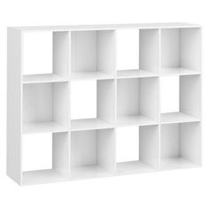 a white bookcase with six cubes on the front and four shelves below it