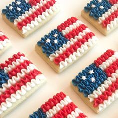 american flag cookies are arranged in rows on a table