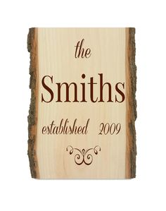 a wooden plaque with the words, the smiths established 2009