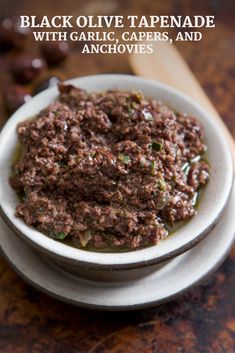 black olive tapenad with garlic, capers and anchovies in a bowl