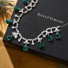 Ross-Simons - 20.00ct t. w. Emerald, .28ct t. w. Diamond Necklace in Silver. 16". Beauty on a budget! This 20.00 ct. t. w. pear-shaped emerald and .28 ct. t. w. round diamond necklace creates an elegant display glamorous enough for an appearance at a royal court or a red carpet event. Set in polished sterling silver and stationed on a rope chain with a 2" extender. Lobster clasp, diamond and emerald necklace. Emerald birthstones are the perfect gift for May birthdays. Formal White Gold Emerald Necklace, Formal Emerald Necklace With Brilliant Cut, Elegant Pear-shaped Emerald Necklace For Formal Occasions, Elegant Formal Pear-shaped Emerald Necklace, Classic Emerald Necklace With Diamond Accents For Formal Occasions, Classic Emerald Necklace With Diamond Accents For Formal Events, Elegant White Gold Teardrop Emerald Necklace, Formal White Gold Pear-shaped Emerald Necklace, Elegant Teardrop Emerald And Diamond Necklace