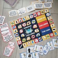 a board game with words and pictures on the board, along with other games to play