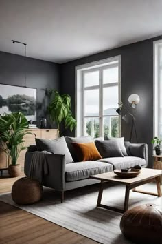 a living room filled with lots of furniture and plants on top of a wooden floor