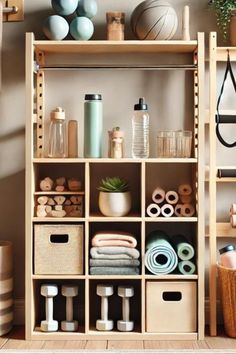 a shelf filled with lots of different items on top of a wooden floor next to a wall