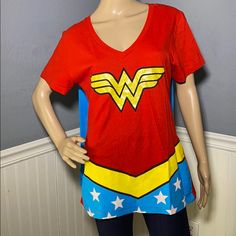 a female mannequin wearing a superman t - shirt