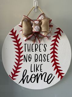 there's no base like home sign with baseballs and burlocks on it