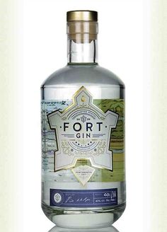 a bottle of fort gin on a reflective surface