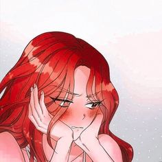 a girl with red hair is holding her hands to her face