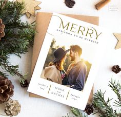 a merry and joyous to be married card with pine cones on the table next to it