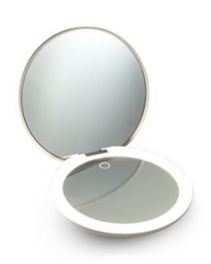 What It Is:A compact lighted mirror that includes both a 1x standard mirror and a 10x magnified mirror. It is a must-have for makeup and skincare touch-ups on the go. Featuring Ilios' signature lighting, you'll see every detail in true color for a flawless and color-correct look. The oversized 5 mirror lets you see your full face while still being light enough to throw in a purse or backpack. A built-in long-lasting rechargeable battery will keep you powered up for weeks (10+ hours of constant power).What It Does:- Dimmable.- Simulates true daylight.- 15-minute auto shut off.- Rechargeable long-lasting battery. Lighted Mirror, Makeup And Skincare, Compact Mirror, Full Face, Rechargeable Battery, Color Correction, Mirror With Lights, Beauty Cosmetics, The Go