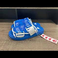 Men’s Size 5 Kappa Authentic Mitel 1 Blue/White Sandals Slides 3118c8w-A3d. Color Is Blue/White. Men’s Size 5. Brand New Without Box! Unisex, Can Be Used As Women’s Too. All Orders Ship Within 1 Business Day! Blue Slides For Summer, Blue Slip-on Slides For Streetwear, Sporty Blue Flat Sandals, Kappa Slides, Kappa Shoes, Yellow Slides, Cool Slides, White Slippers, White Slides