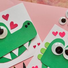 two valentine's day cards made to look like alligators with hearts on them