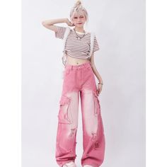 Step into summer with flair in our Pink High Waist Wide Leg Jeans, tailored for the fashion-forward and crafted for comfort. Blending classic vintage vibes with a touch of hip hop street style, these jeans are your go-to for making a bold statement while prioritizing comfort. Key Features High Waist Design: Offers a flattering fit that accentuates your waistline. Wide Leg Style: Provides a relaxed feel and a trendy look. Quality Fabric: Made from a blend of cotton and polyester, ensuring durability and comfort. Eye-catching Details: Features buttons, pockets, and subtle ripped decorations for a chic, lived-in look. Seasonal Versatility: Perfect for spring and summer, but stylish enough to wear year-round. Special Attributes What sets these trousers apart is their unique color and design co Jean Rose, Hip Hop Street Style, Jeans Rosa, High Waist Wide Leg Jeans, Vintage Preppy, Style Hip Hop, Jeans Cargo, Pink Jeans, 90s Grunge