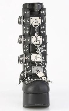 Buckles and studs and keys and locks, oh my! The Charade 118 buckle boots feature weapons, skulls, and studs. Lock in these babies. Pleaser High Heels, Mary Janes Flats, Couture Heels, Alternative Shoes, Goth Boots, Gothic Boots, Vegan Leather Boots, Gothic Shoes, Metal Plates