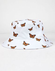 a white bucket hat with orange butterflies on the front and side, sitting against a white background