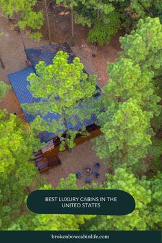 an aerial view of a cabin in the woods with text overlay that reads best luxury cabins in the united states