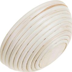 a white round wooden object on a white background