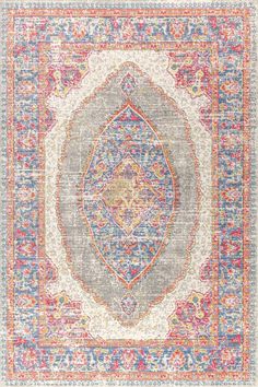 a rug with an ornate design on the front and back side, in multicolored colors