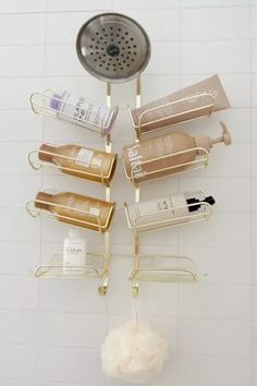 a shower caddy filled with lots of different types of hair products and soaps