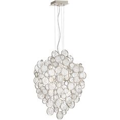 a chandelier with many glass balls hanging from it's ceiling light fixture