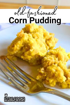 an old fashioned corn pudding on a plate with a fork