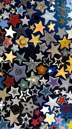 many different colored stars are arranged together