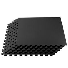 black interlocked rubber floor tiles on white background