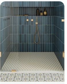 a shower with blue tile and gold fixtures