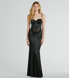 Who could resist your incredible allure in the Kaya bustier formal dress at red carpets or galas? Sheer mesh and textured panels in figure-flaunting patterns along the satin fabric bring edgy elegance to this floor-length masterpiece!  With a sweetheart neckline and a built-in padded underwire bust, this dress offers sexy lifted support. The adjustable spaghetti straps and mermaid silhouette create a flattering fit. Complete the look in high heels and a ring set.Fit & FeaturesSheer mesh and Fitted Floor-length Satin Dress For Prom, Sleek Fitted Floor-length Satin Dress, Fitted Evening Dress With Boned Bodice, Fitted Bias Cut Satin Prom Dress, Black Satin Evening Dress With Fitted Bodice, Silk Evening Dress With Corset Back, Silk Evening Dress With Corset Back For Formal Occasion, Fitted Evening Corset Dress With Boning, Fitted Evening Dress With Boned Bodice For Gala