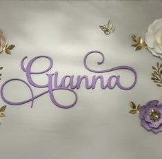 the name giana spelled in cursive purple letters surrounded by flowers and butterflies