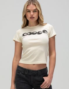 Bdg Urban Outfitters Lucky Ball Baby Tee. Graphic Screened Across Center Chest. Ribbed Crew Neckline. Short Sleeve. Shrunken Fit. 100% Cotton. Machine Wash. Imported. Model Is Wearing A Size Small. Model Measurements:height: 5'7" Bust: 32"waist: 25"hips: 35" Streetwear Fashion Tops, Urban Outfitters Baby Tee, Baby Tees Outfit, Theta Merch, Vogue Shirt, Emily Cook, Mini Tees, Big Graphic Tee, Cute Baby Tees