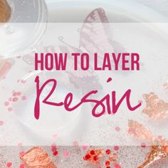 the words how to layer resin on a white plate with pink sprinkles