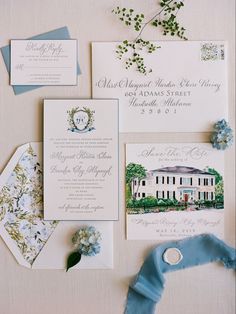 the wedding stationery is laid out and ready for guests