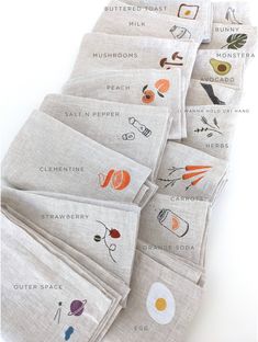 six linen placemats with different designs on them