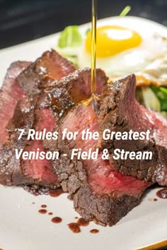 a steak on a plate with an egg in the background and text that reads rules for the greatest venison, field & stream