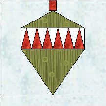 a christmas ornament with red cones on it