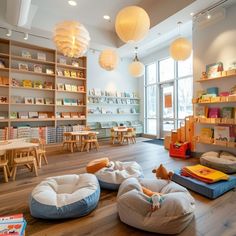 the children's room has many bookshelves and toys on display in it