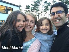 a man and two girls are smiling for the camera