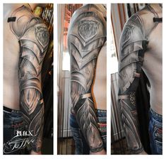 a man's arm and shoulder covered in tattoos with armor on the sleeves,