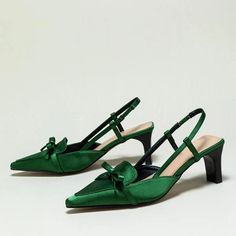 Elevate your style with these elegant Green Satin Slingback Loafer Heels. Featuring a pointed toe and bow embellishment, these heels are perfect for adding a touch of sophistication to any outfit. Color: Green Material: Satin Heel Type: Block heel Heel height: 2.36" / 60 mm approx Product measurements were taken using size 8. Please note that measurements may vary by size. Toe: Pointed toe Bow embellishment Handcrafted US sizing. Fits true to size. Party Slingback Pumps With Bow Straps And Low Heel, Elegant Green Slingback Pumps For Formal Occasions, Party Slingback Pumps With Bow Straps And Pointed Toe, Chic Slingback Pumps With Bow Straps For Party, Elegant Green Slingback Pumps For Evening, Chic Flat Heel Slingback Pumps For Party, Slingback Heels With Bow For Party, Elegant Summer Slingback Pumps With Bow, Workwear Slingback Pumps With Bow