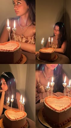 a woman sitting in front of a cake with lit candles