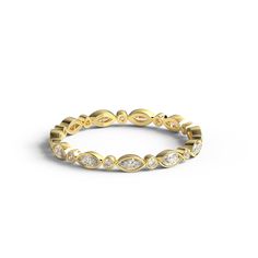 a yellow gold ring with white diamonds