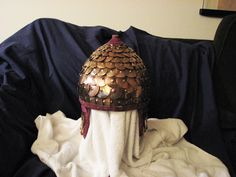 a helmet is sitting on top of a white towel