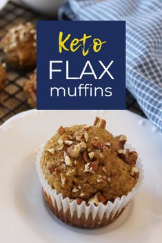 a close up of a muffin on a plate with the words keto flax muffins above it