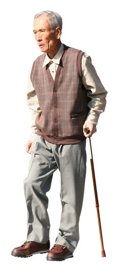 an old man is holding a cane and standing with his hand on the back of his hip